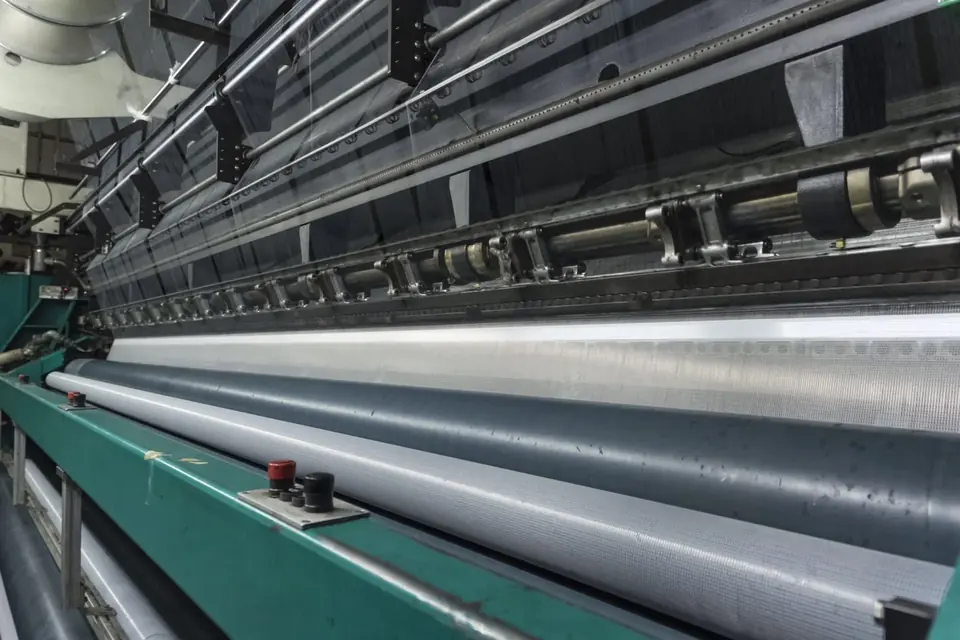 Polyester scrim weaving at the factory